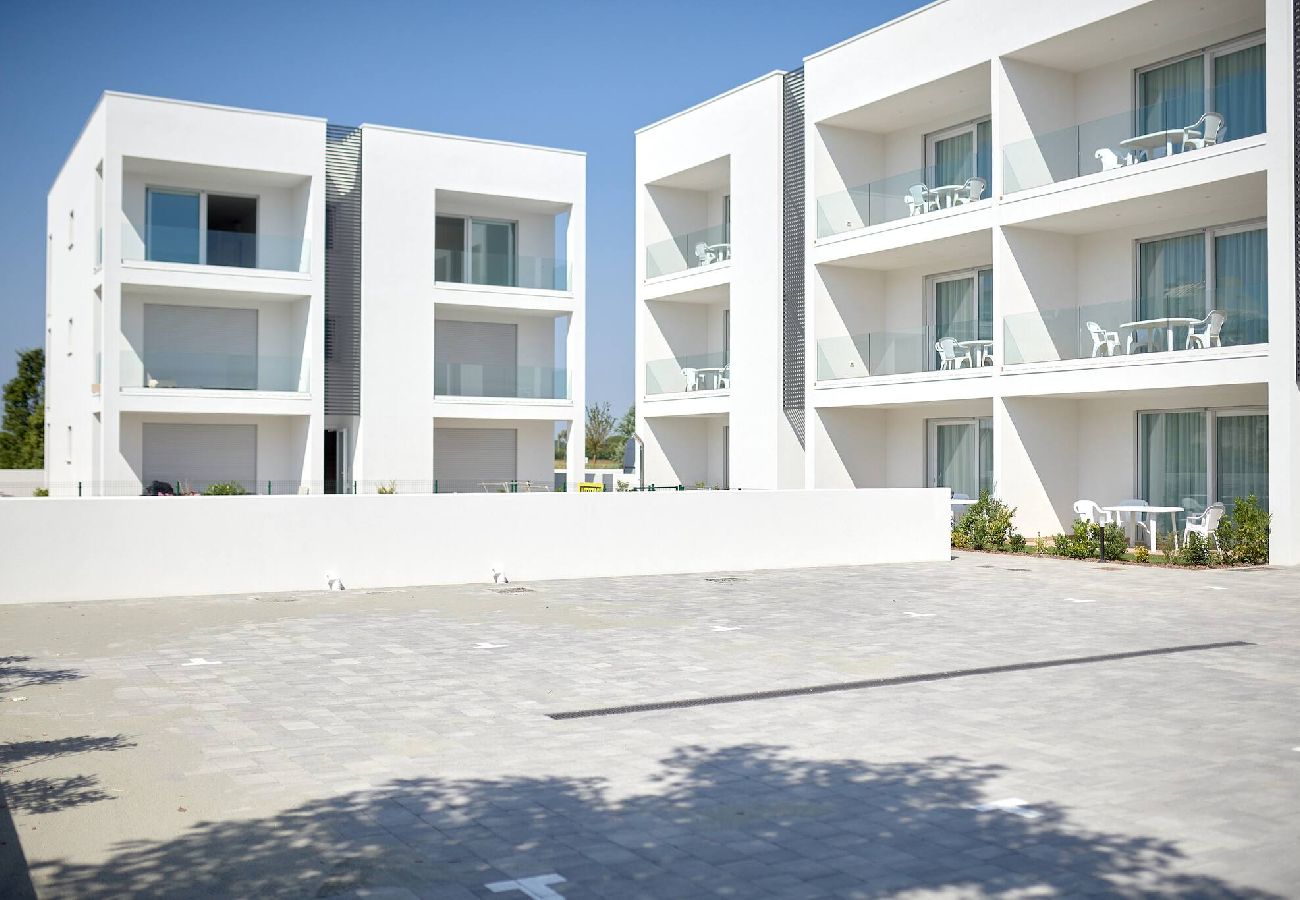 Ferienwohnung in Jesolo - West Village Appartamento - NUOVO con piscina 