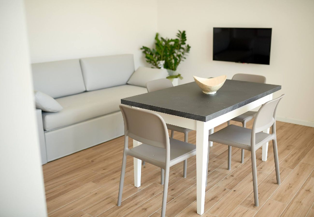Ferienwohnung in Jesolo - West Village Appartamento - NUOVO con piscina 