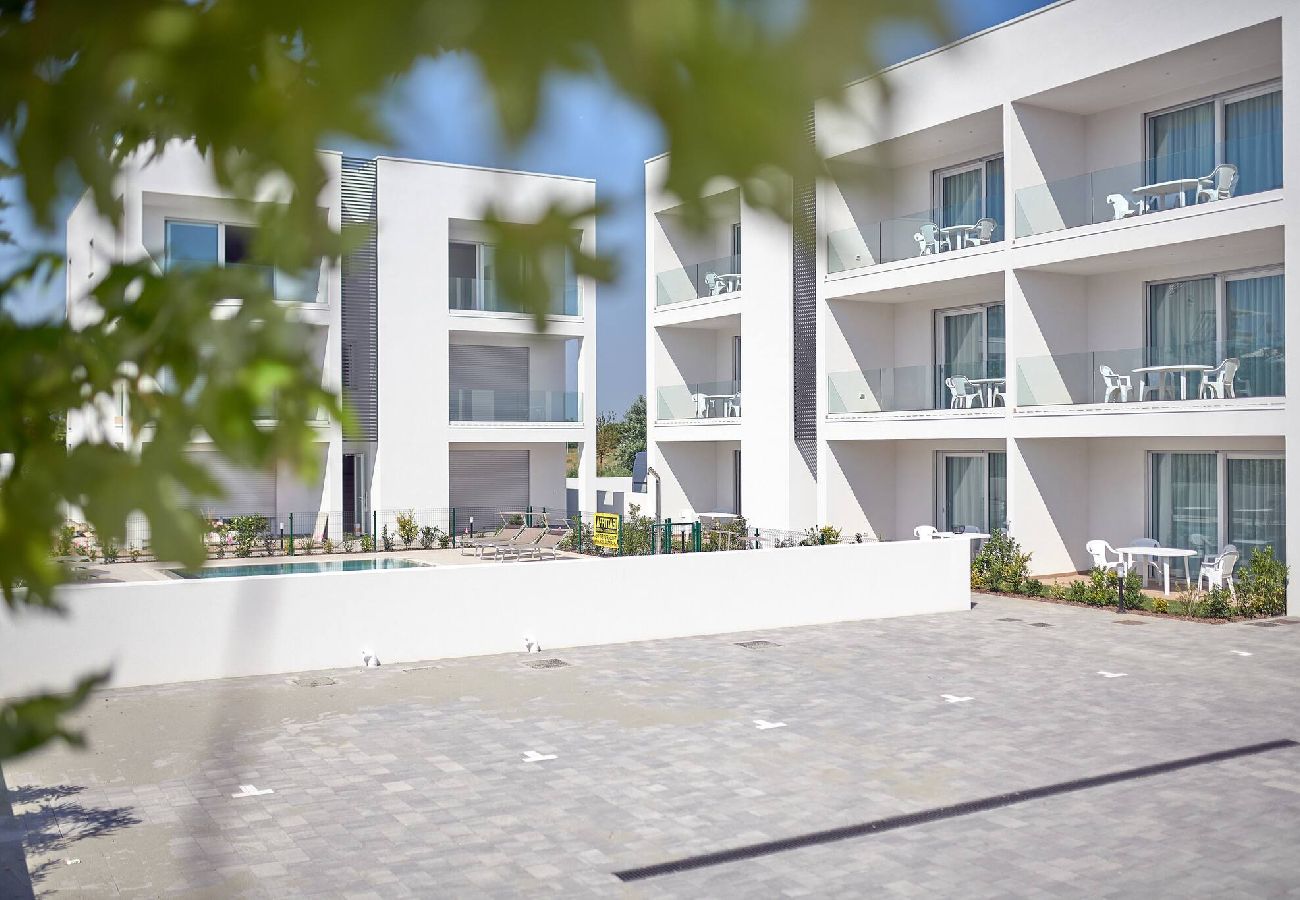 Ferienwohnung in Jesolo - West Village Appartamento - NUOVO con piscina 